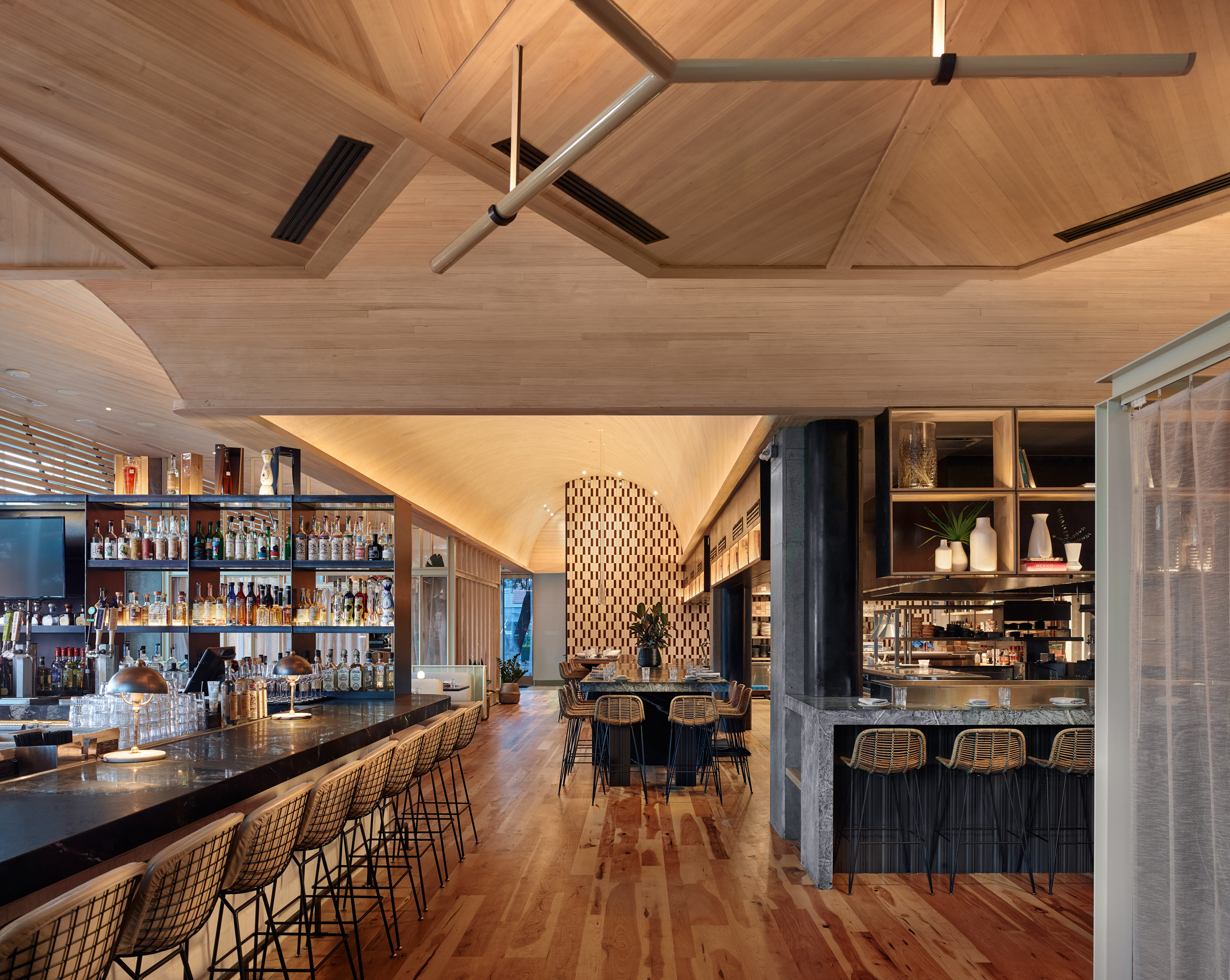 Wooden Ceiling Curves Over Restaurant In Austin By Michael Hsu