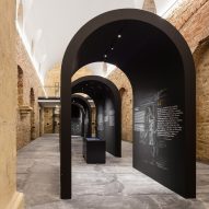 This restored church in Alenquer, central Portugal has been repurposed by Spaceworkers to include an arched exhibition space that commemorates the life and historical legacy of Portuguese philosopher and scholar Damião de Gois.