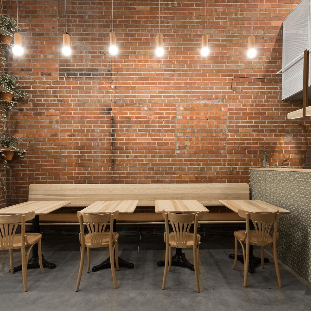 Narrow Lebanese Snack Bar In Montreal Features Array Of Ash Furniture