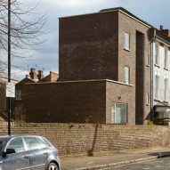 Madoc Architecture builds house with curved recess to "bookend" a London terrace
