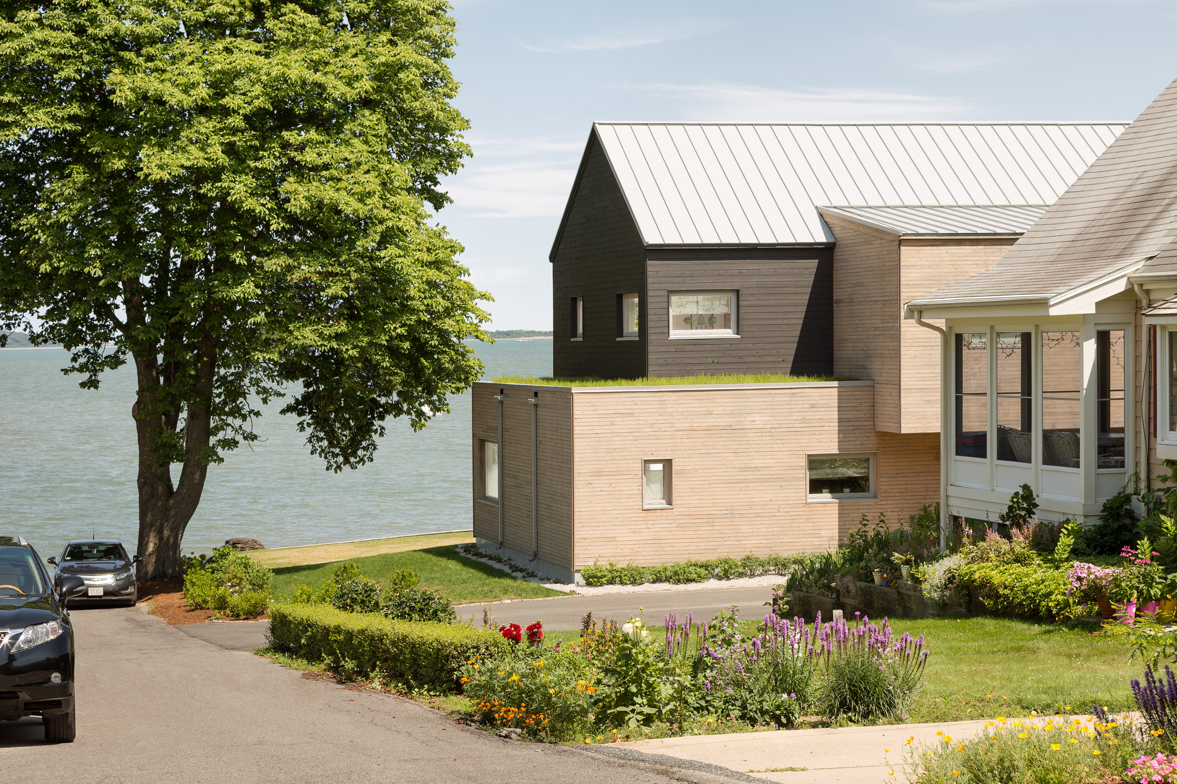 Go Logic creates gable-roofed home for oceanfront site in Massachusetts