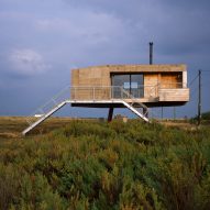 Redshank artist's studio is a cork-clad cabin raised above a tidal salt marsh