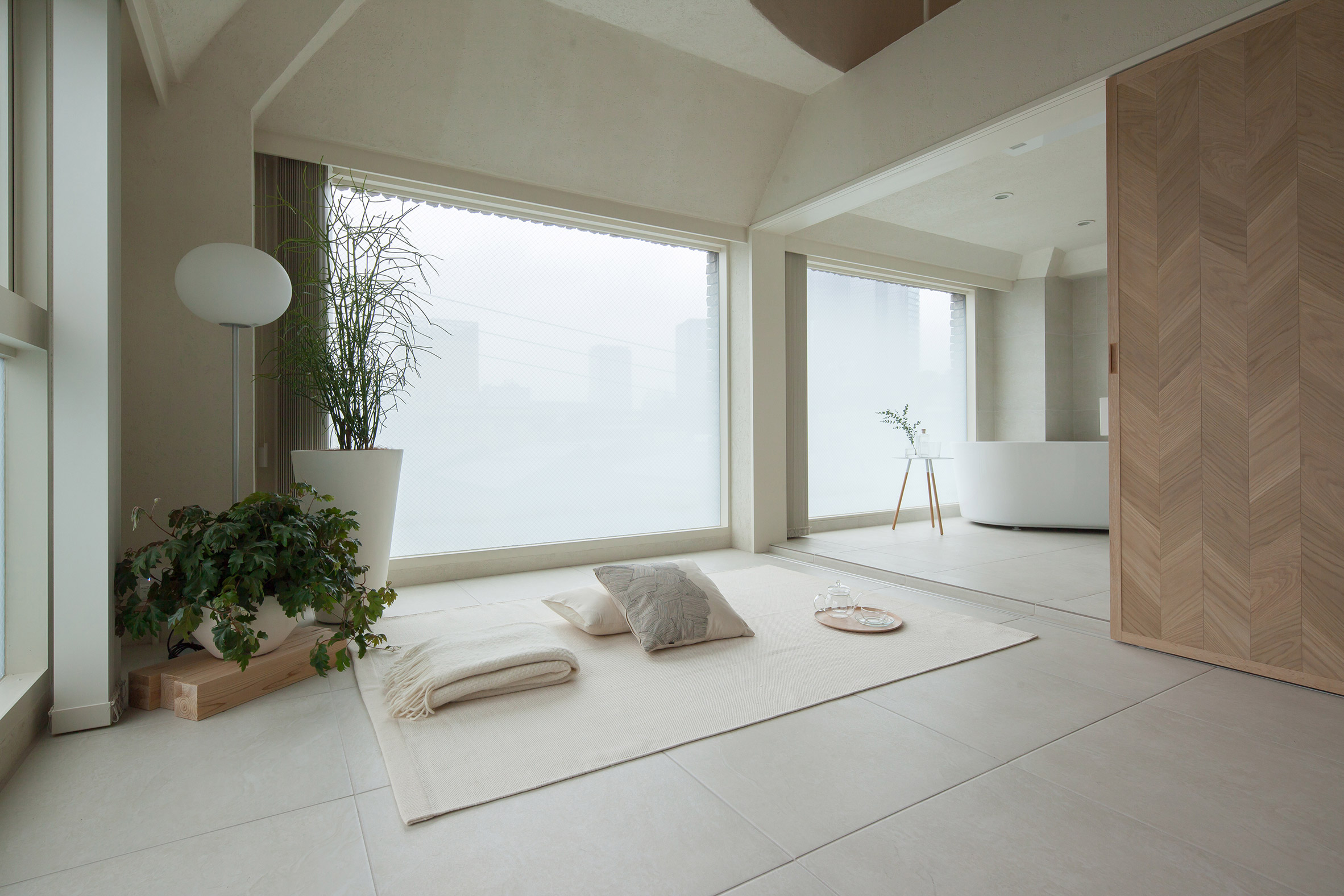 Hiroyuki Ogawa Architects divides up tiny Tokyo apartment with sliding screens