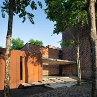 Studio Air Putih combines brick with rusted steel and concrete at Jakarta offices
