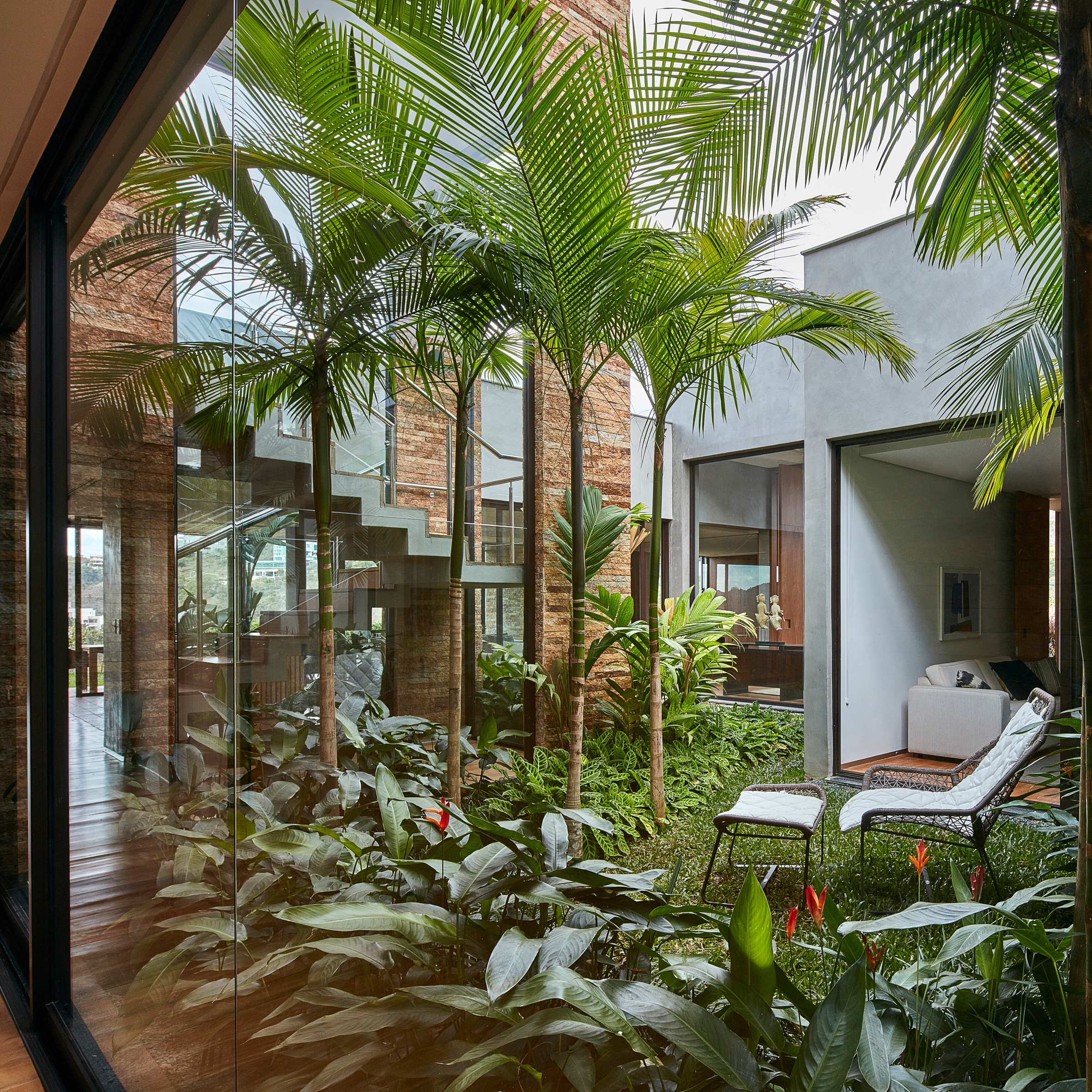 David Guerra Wraps Brazilian House Around Courtyard Filled With Tropical Plants