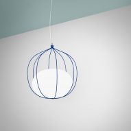 Front's Hoop lamp features glass pendant trapped inside wire cage