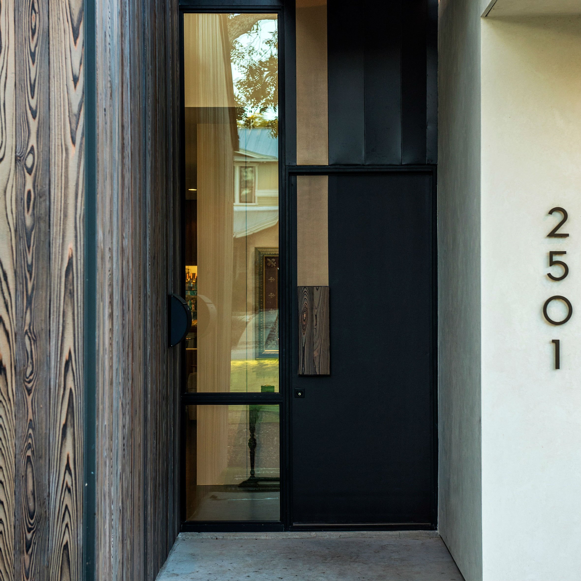 10 entrances that involve sliding, pivoting and rotating doors | Dezeen