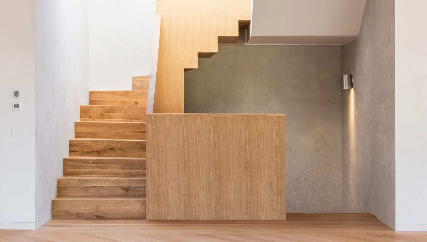 Recess Building Feature Stone-clad apartment building in Bucharest features recessed windows ...