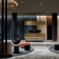 Space Copenhagen renovates landmark Arne Jacobsen hotel using updated classic furniture