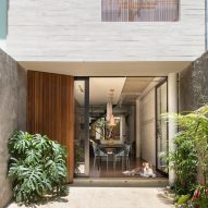 Estúdio BRA creates slender urban home for young couple in São Paulo