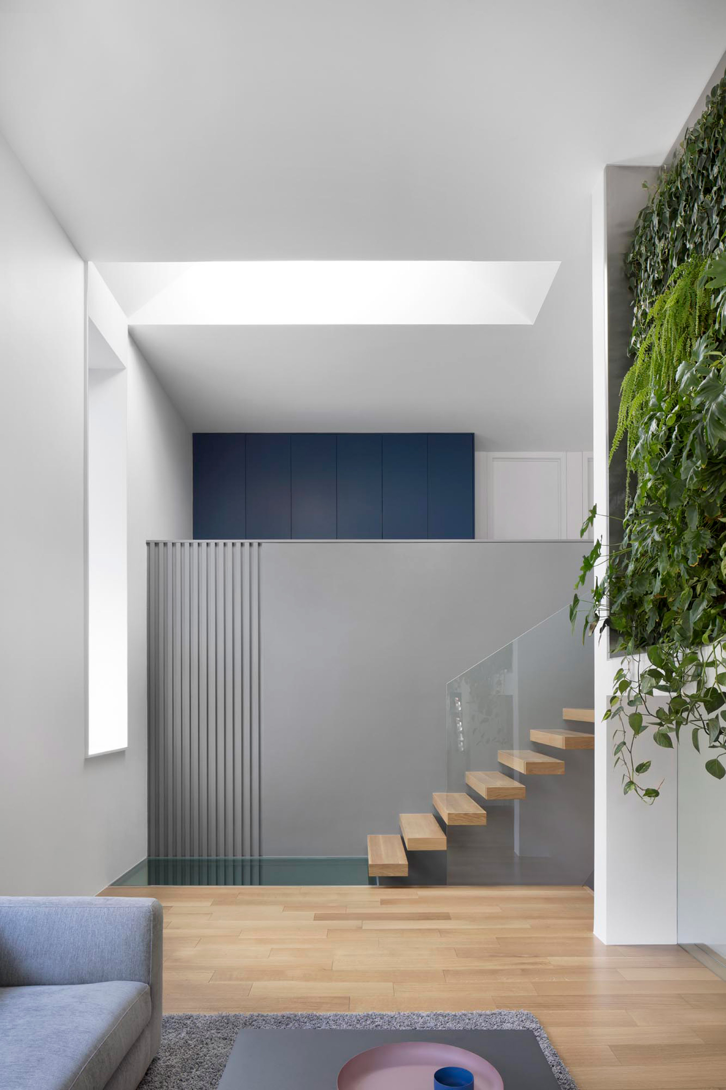 Naturehumaine enlivens mid-century Montreal house with plant-covered wall