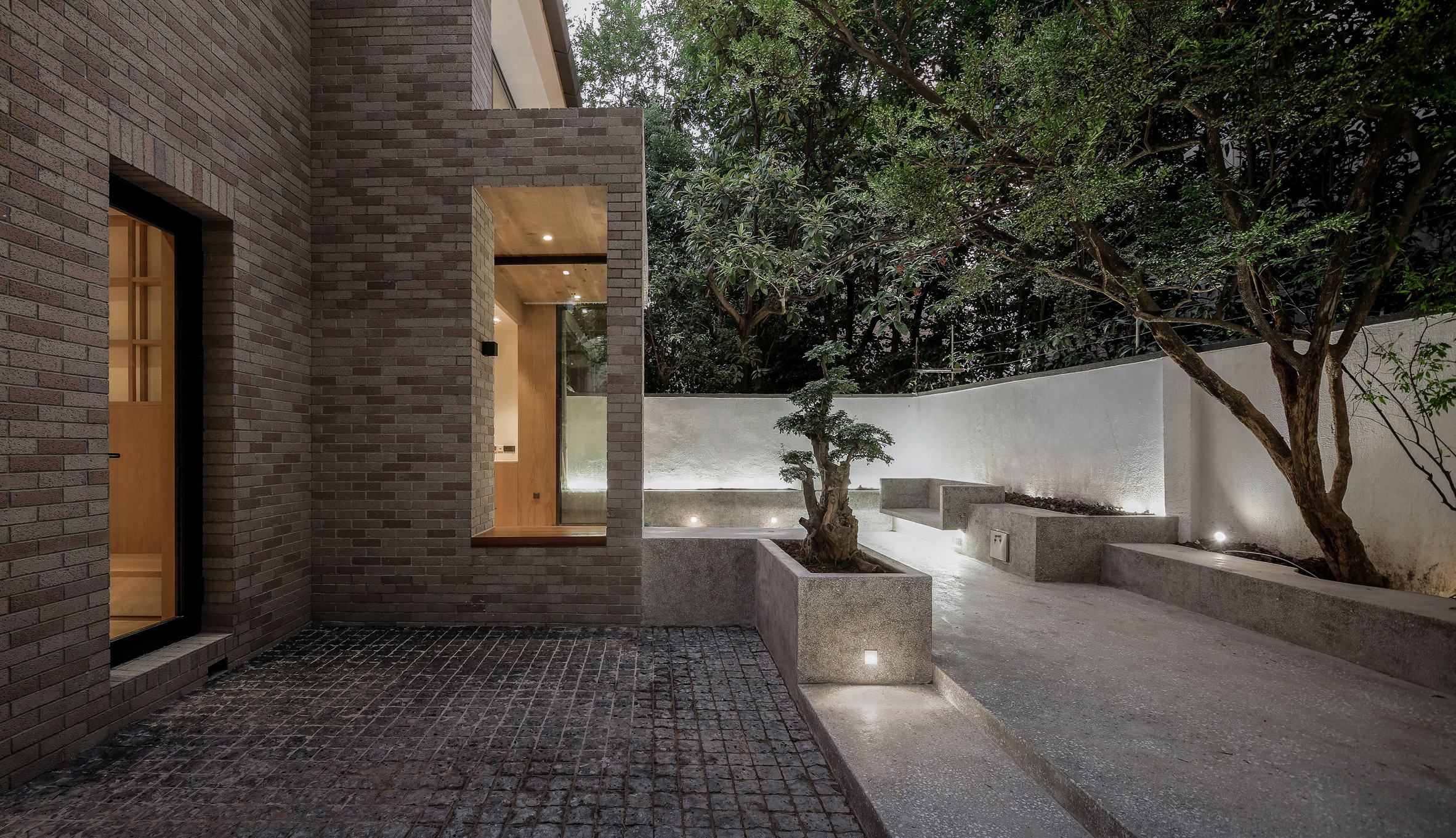 The House With A Tiny Patio by Atelier Tao+C