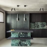 Arjaan de Feyter uses moody material palette for Belgian lawyers office