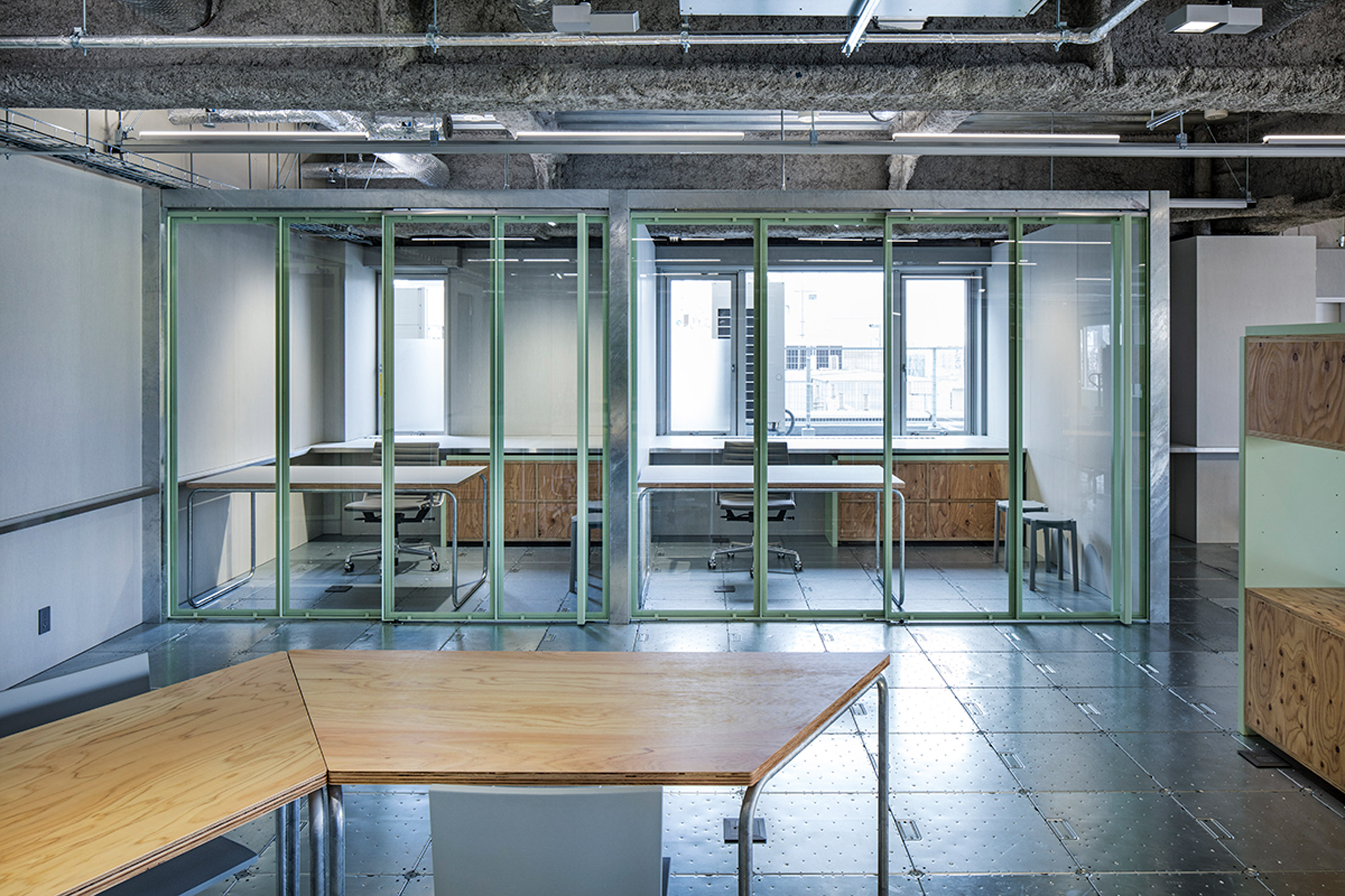 Schemata Architects adds movable furniture to Tokyo record label offices