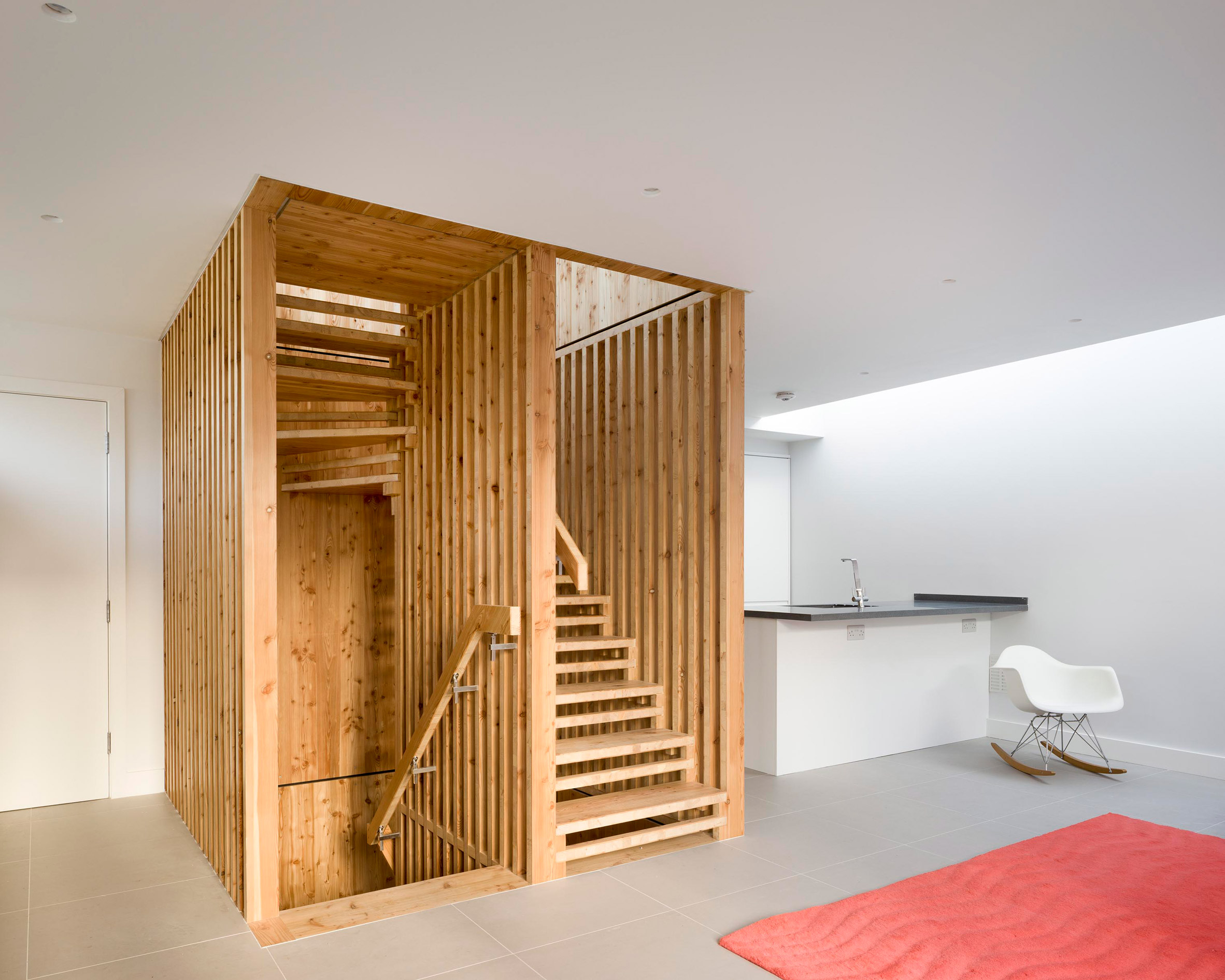 Hundreds of timber components slot together to form statement staircase at WG+P's Askham Road house