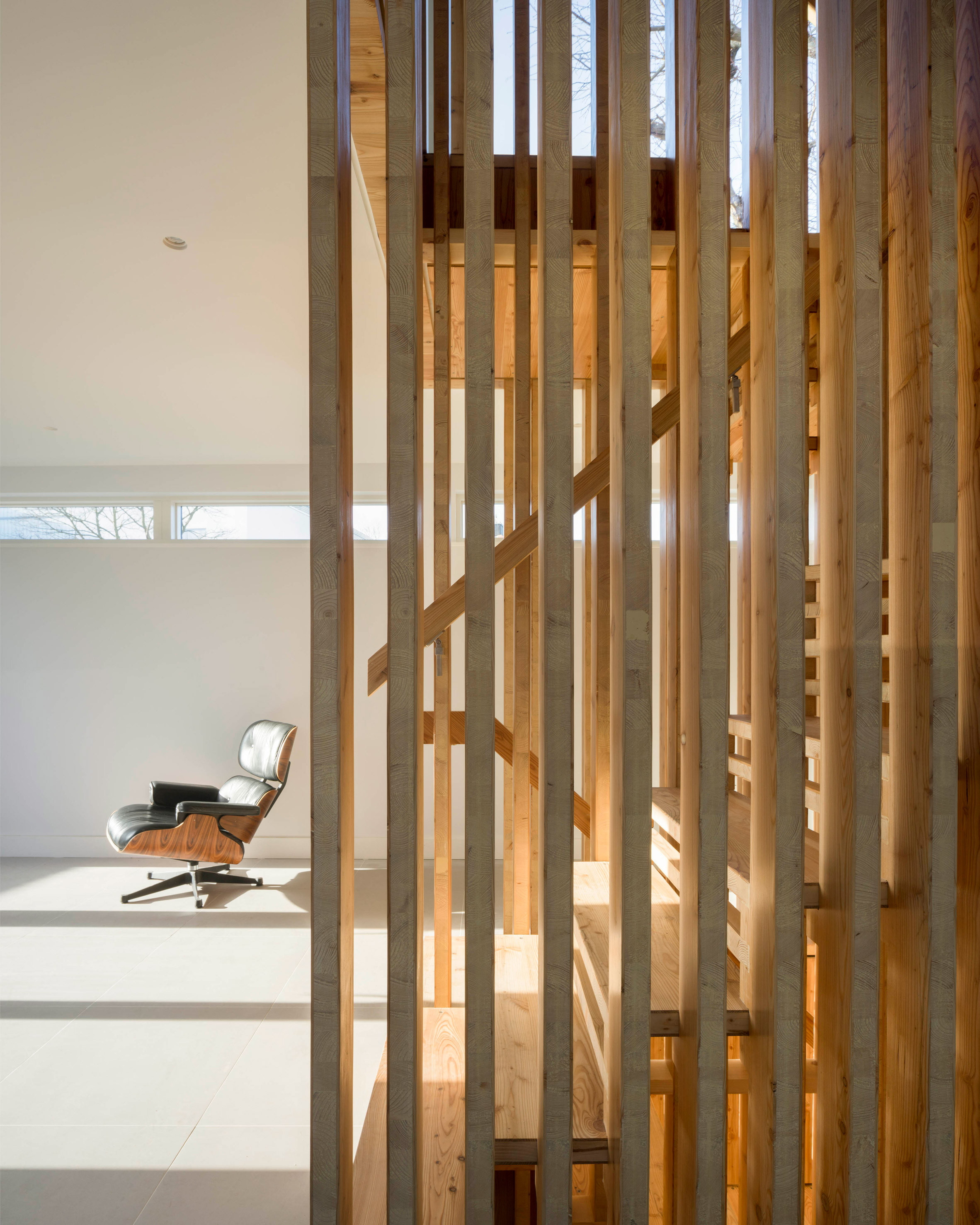 Hundreds of timber components slot together to form statement staircase at WG+P's Askham Road house