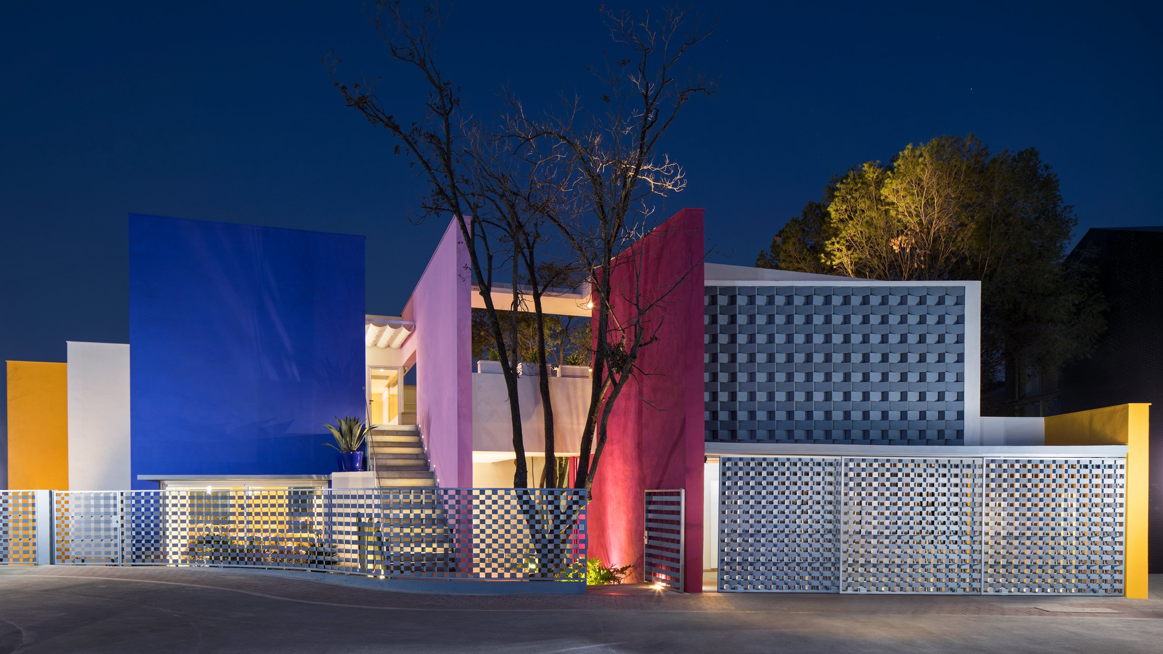Colourful Barragán-esque house by Moneo Brock wraps four trees