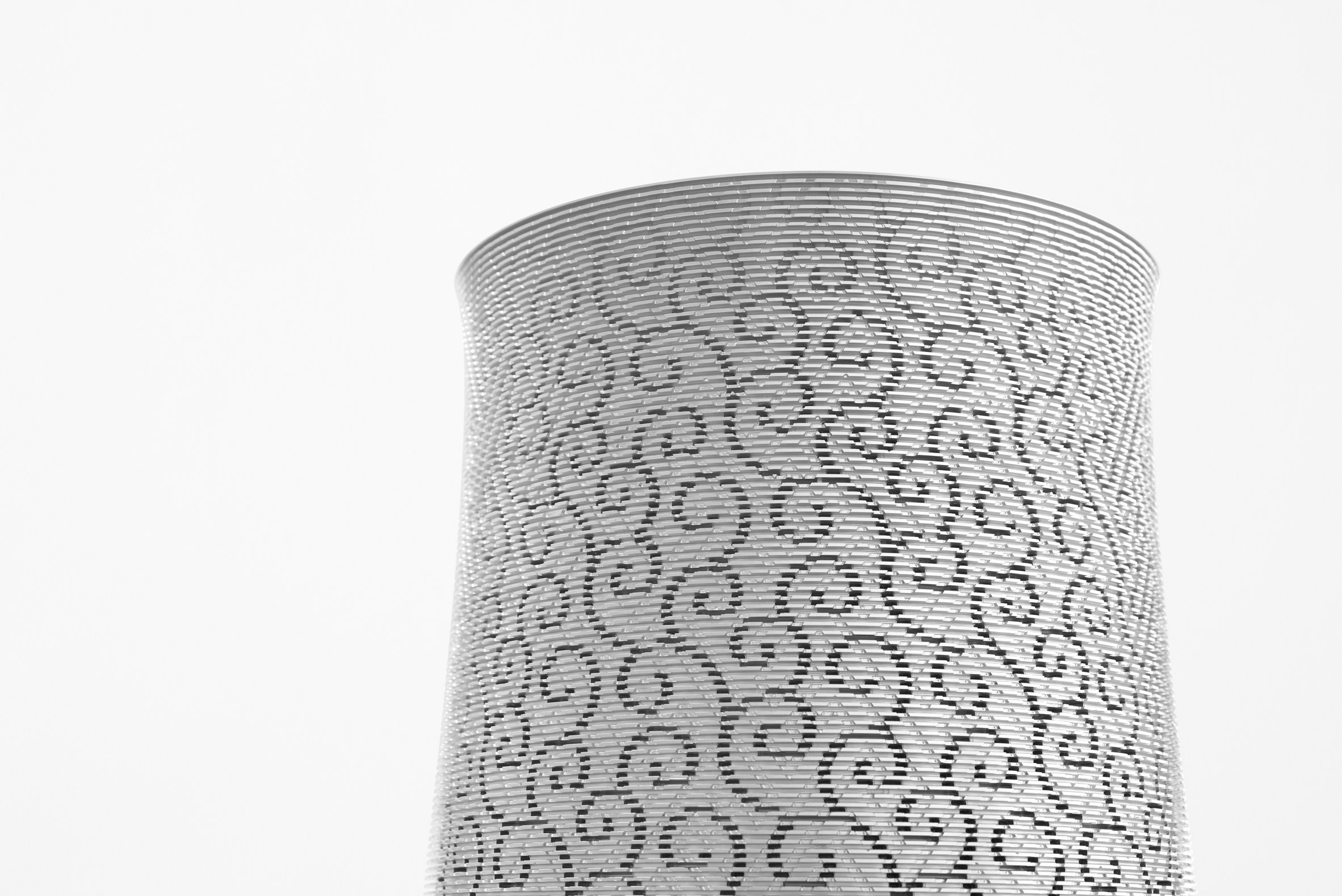 Nendo carves "four layered" vase from a single  kilo block of