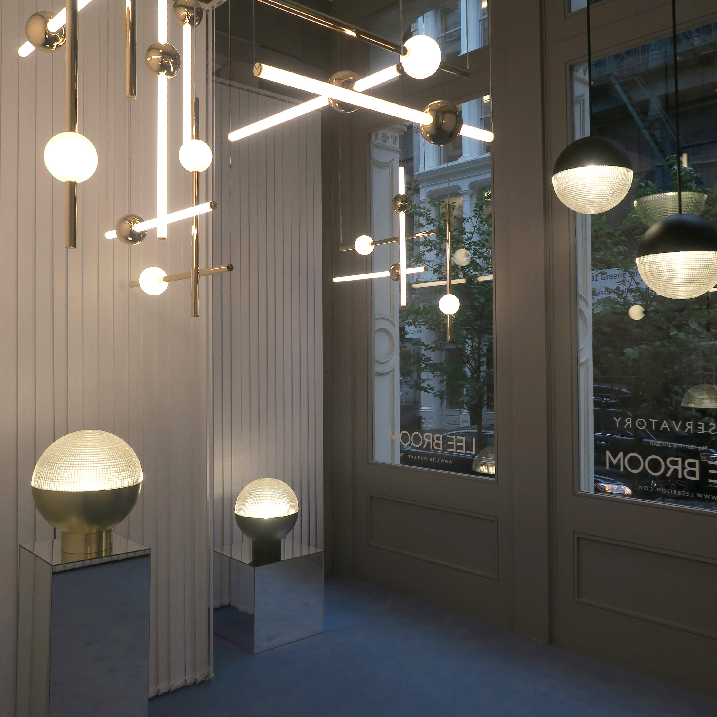 Lee Broom debuts globe-shaped lamp in New York