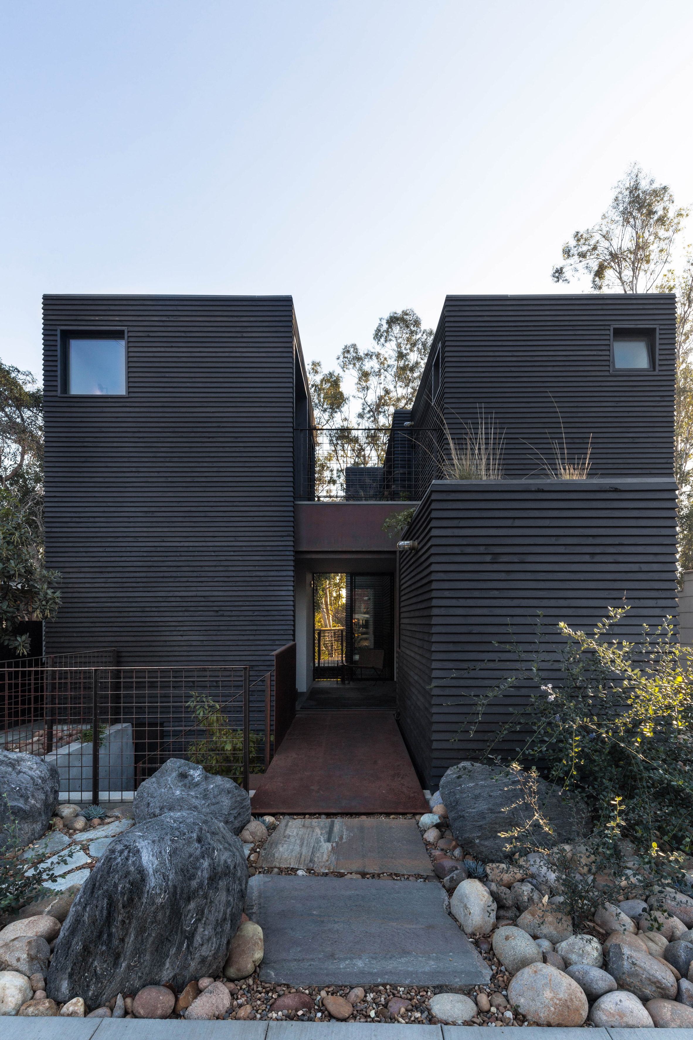 Jeff Svitak builds blackened Redwood House with private studio for himself in Southern California