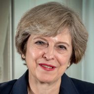 Theresa May praises UK architects at 10 Downing Street reception as artists slam schools policy