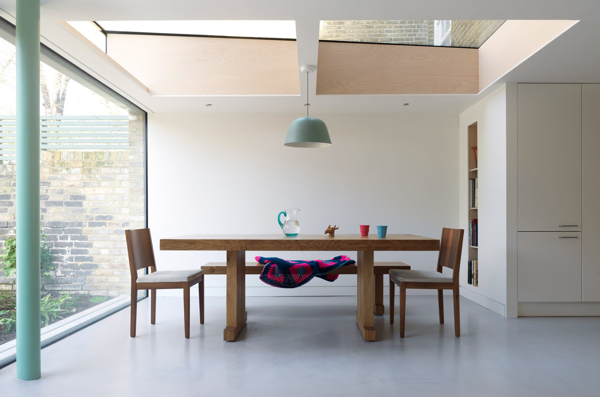 Glazed extension seamlessly connects refurbished Highbury house with new patio garden