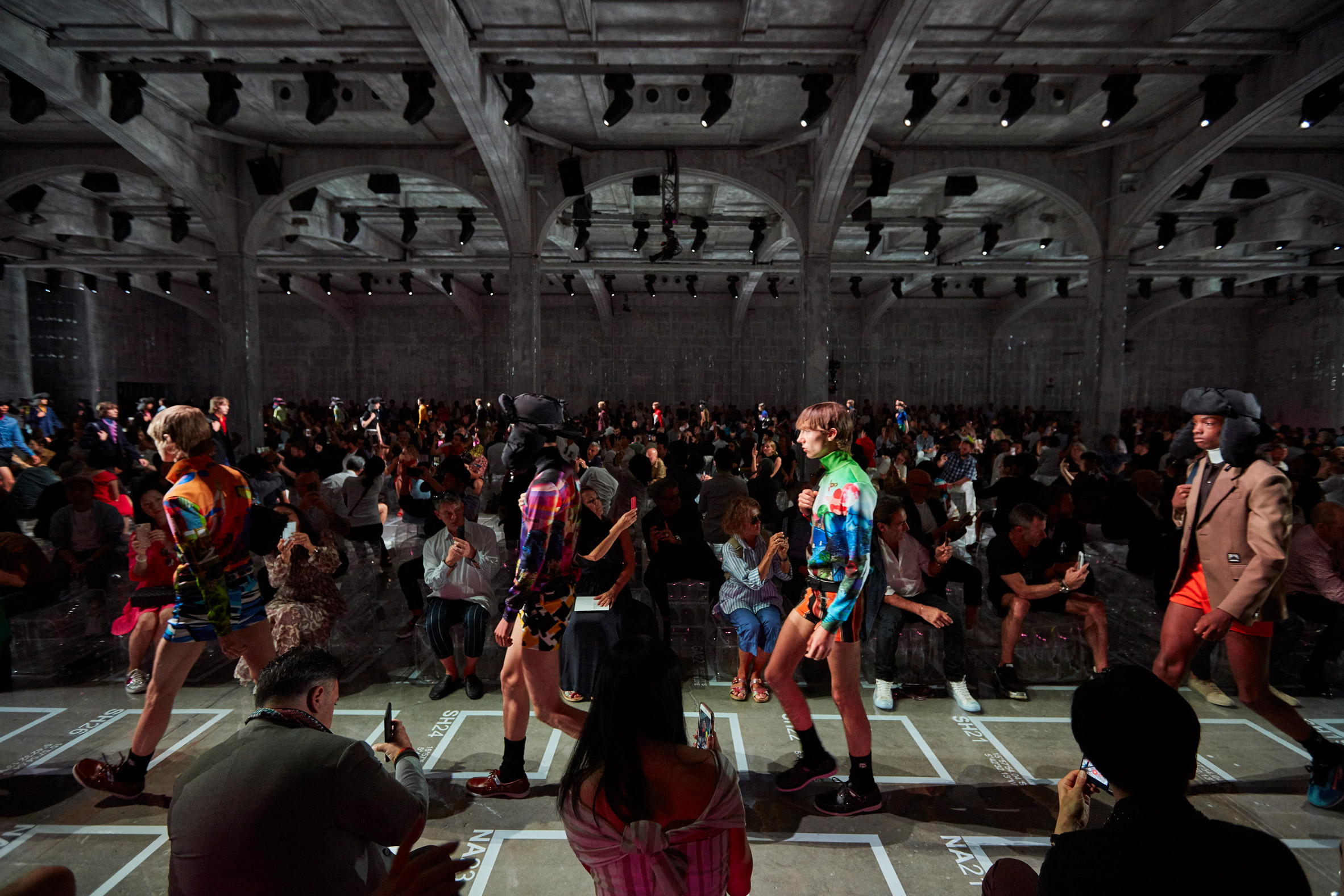 AMO's installs sloping mesh catwalks for Prada fashion show