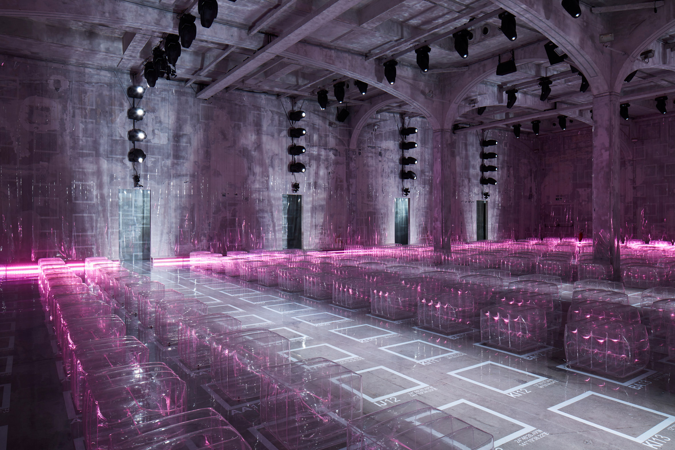 AMO arranges neon-lit Prada catwalk show on strict grid