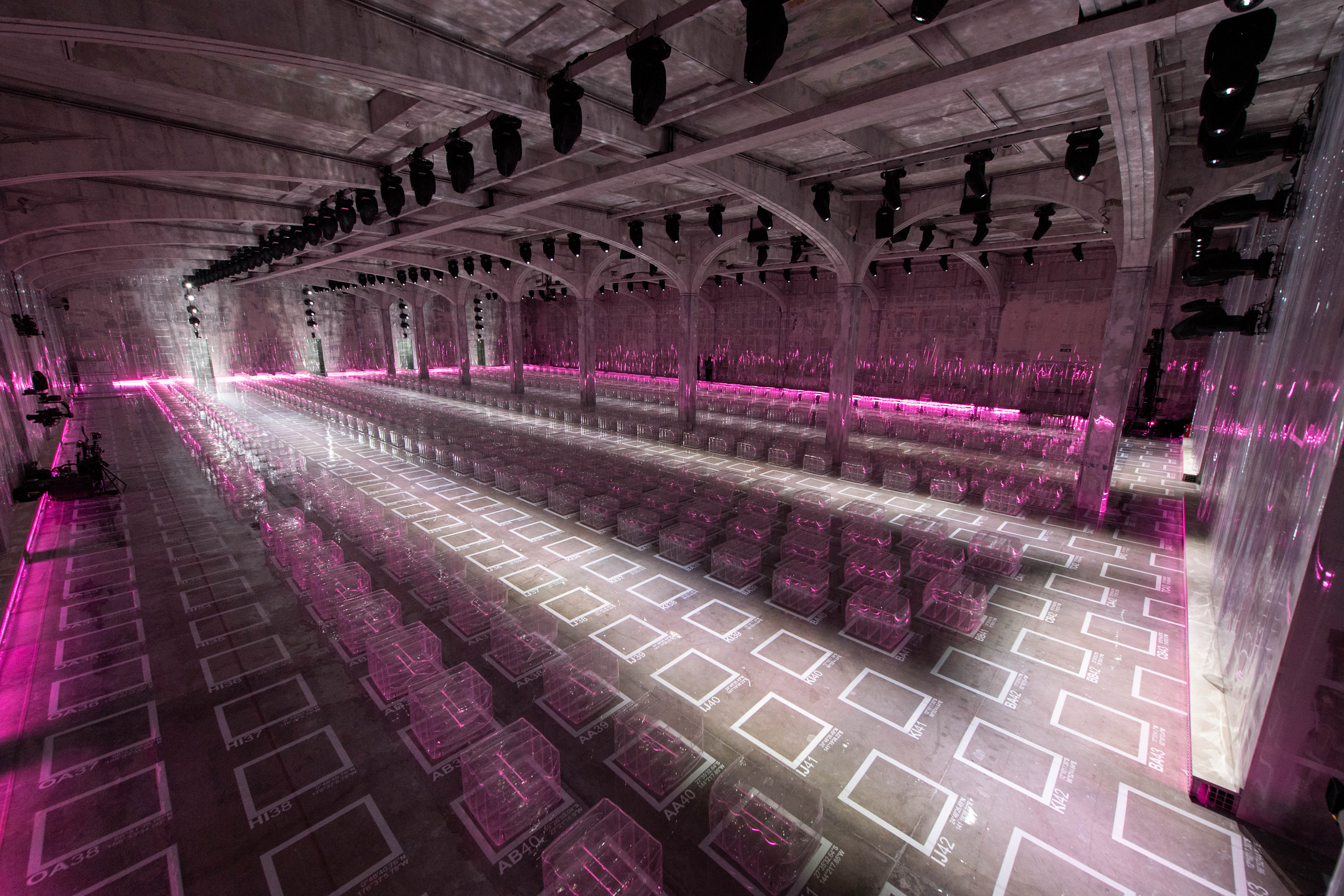 AMO arranges neon-lit Prada catwalk show on strict