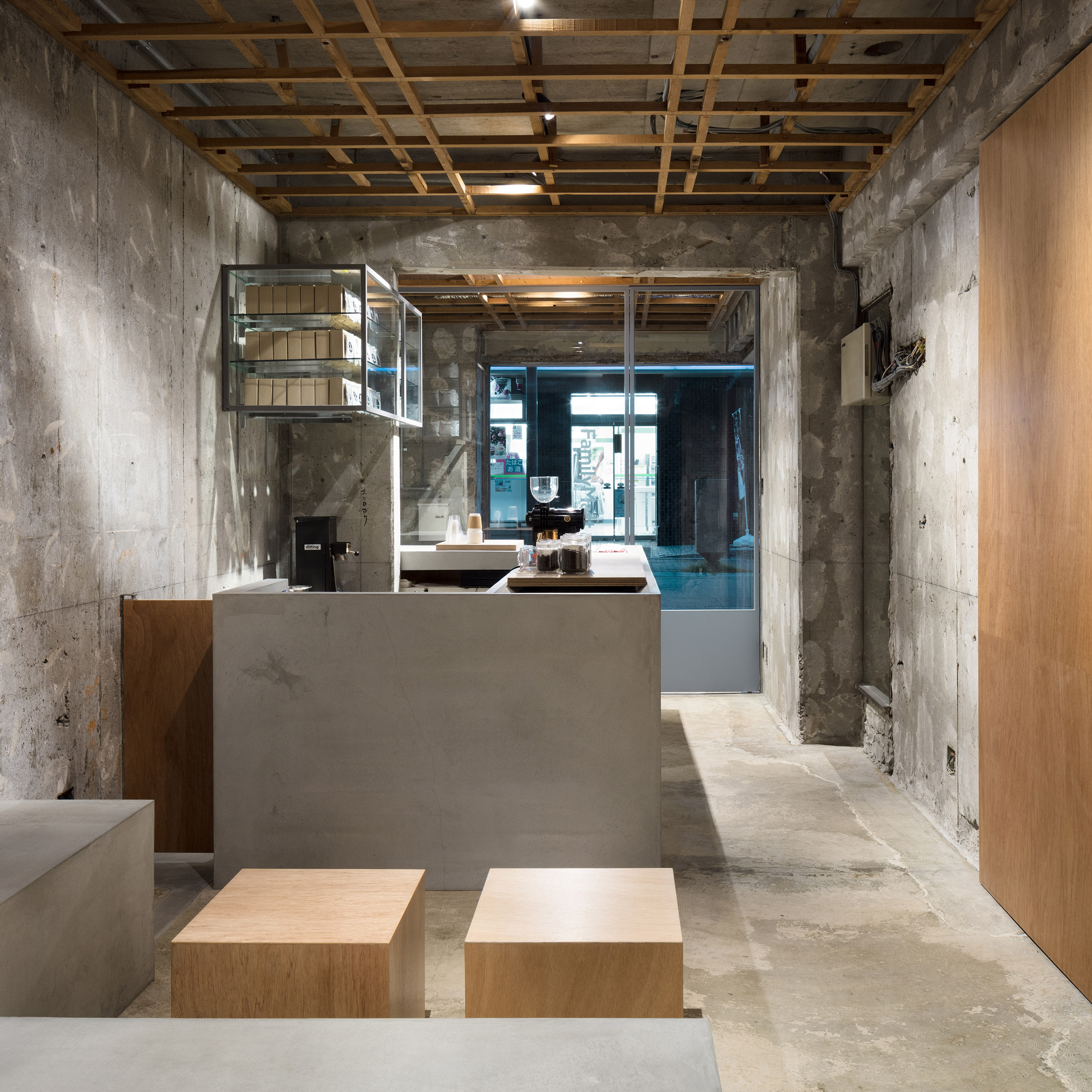 Yusuke Seki Creates Coffee Shop With Raw Concrete Walls In Kobe