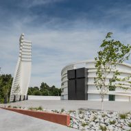 Hugo Correia creates elliptical concrete church in Portugal