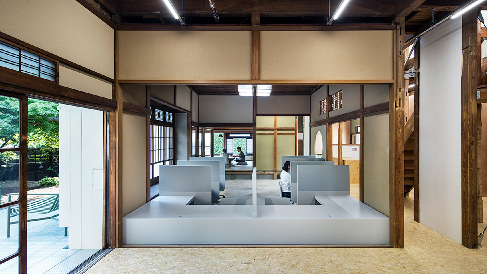 Schemata Architects contrasts original features with modern interventions  for Japanese office