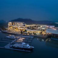 UNStudio reveals new riverside marina and clubhouse inspired by the shape of luxury yachts