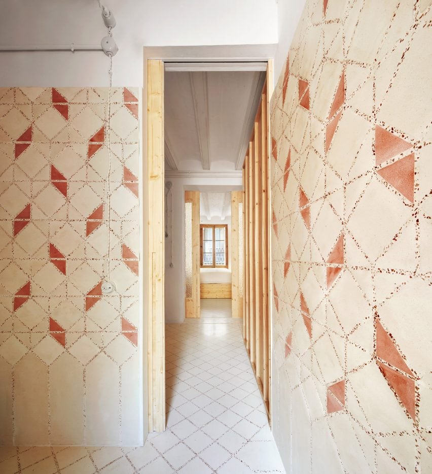 Original tiles are crushed to create a new floor in this Barcelona apartment