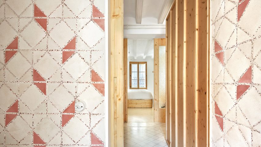 Original tiles are crushed to create a new floor in this Barcelona apartment