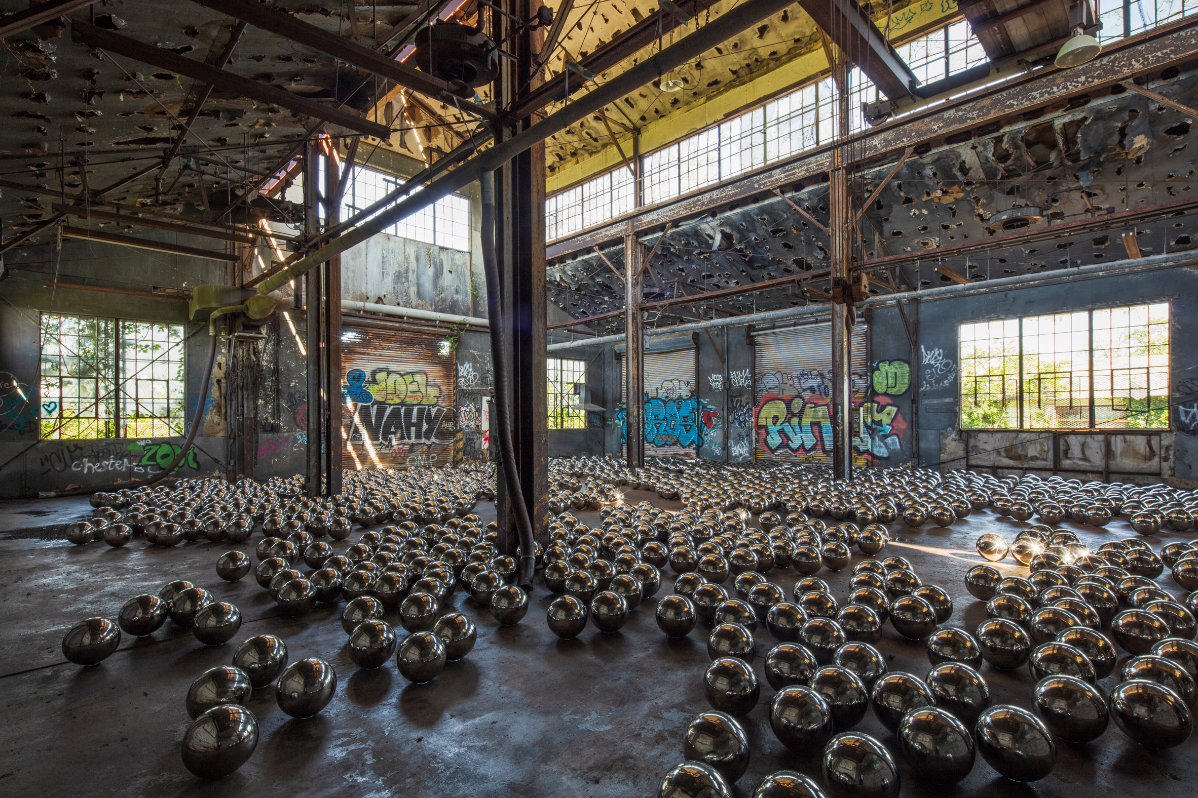 Yayoi Kusama fills abandoned garage in New York's Rockaways with 1,500 mirrored balls