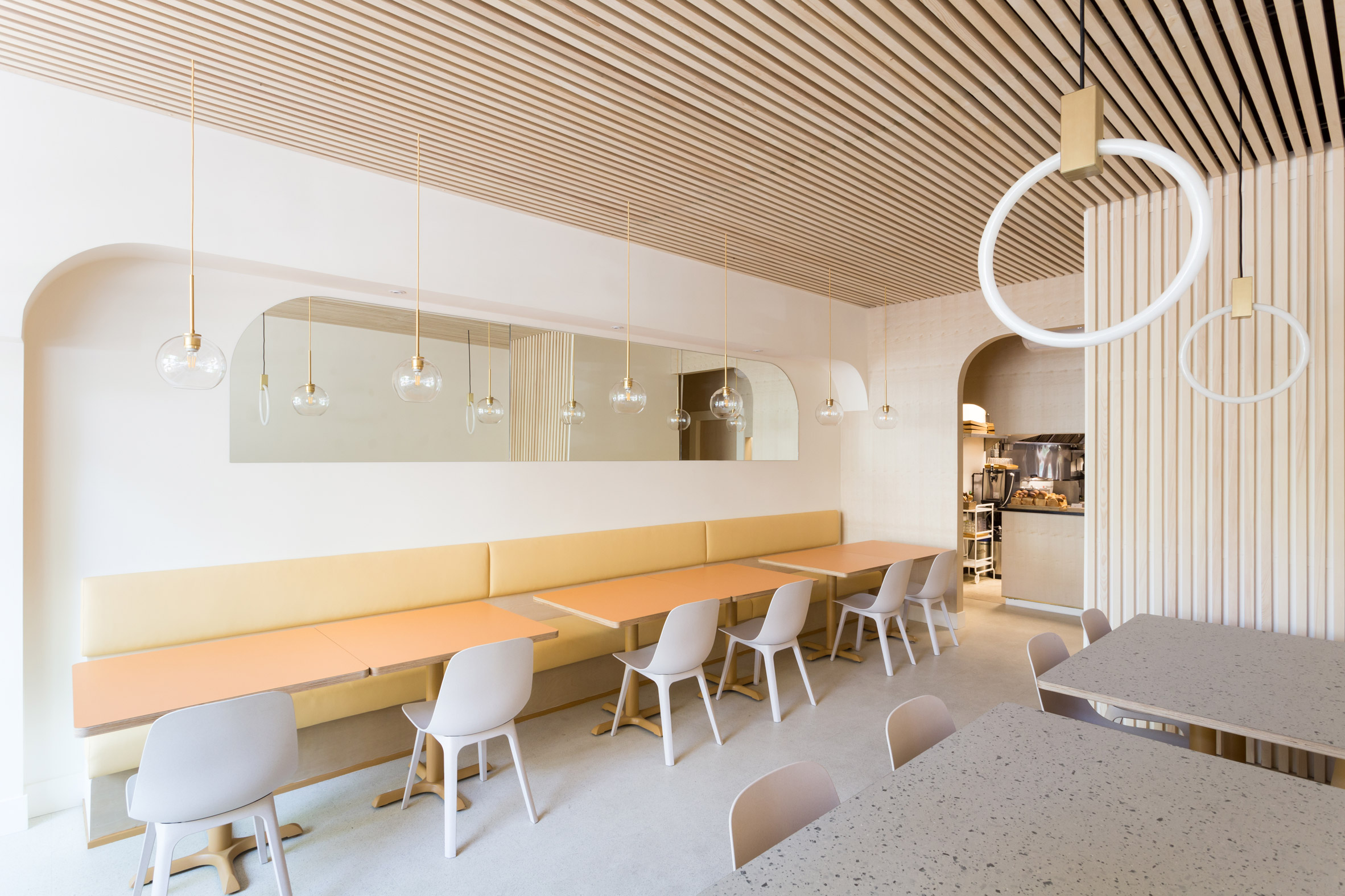 Rane Interiors outfits Japanese restaurant Saku with orange and cream surfaces