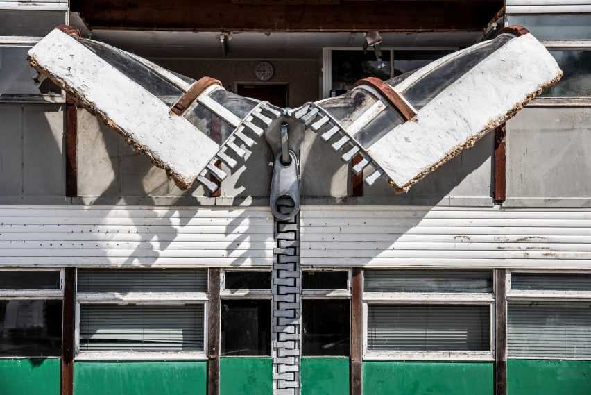Alex Chinneck unzips the walls of a building in latest installation