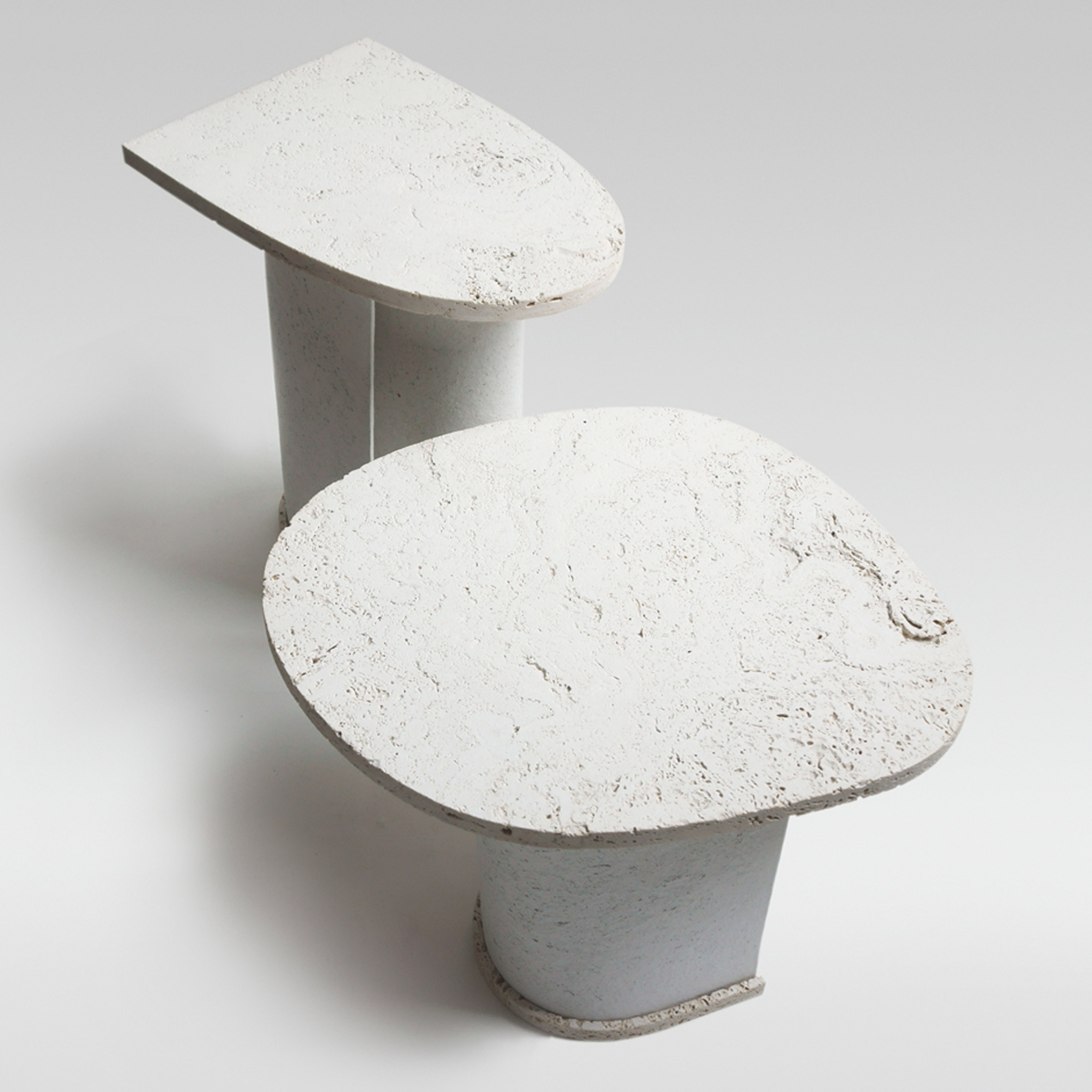 Charlotte Jonckheer makes side tables from recycled paper and stone dust