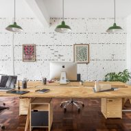 Plywood and plants feature in Solo Arquitetos' studio in Brazil