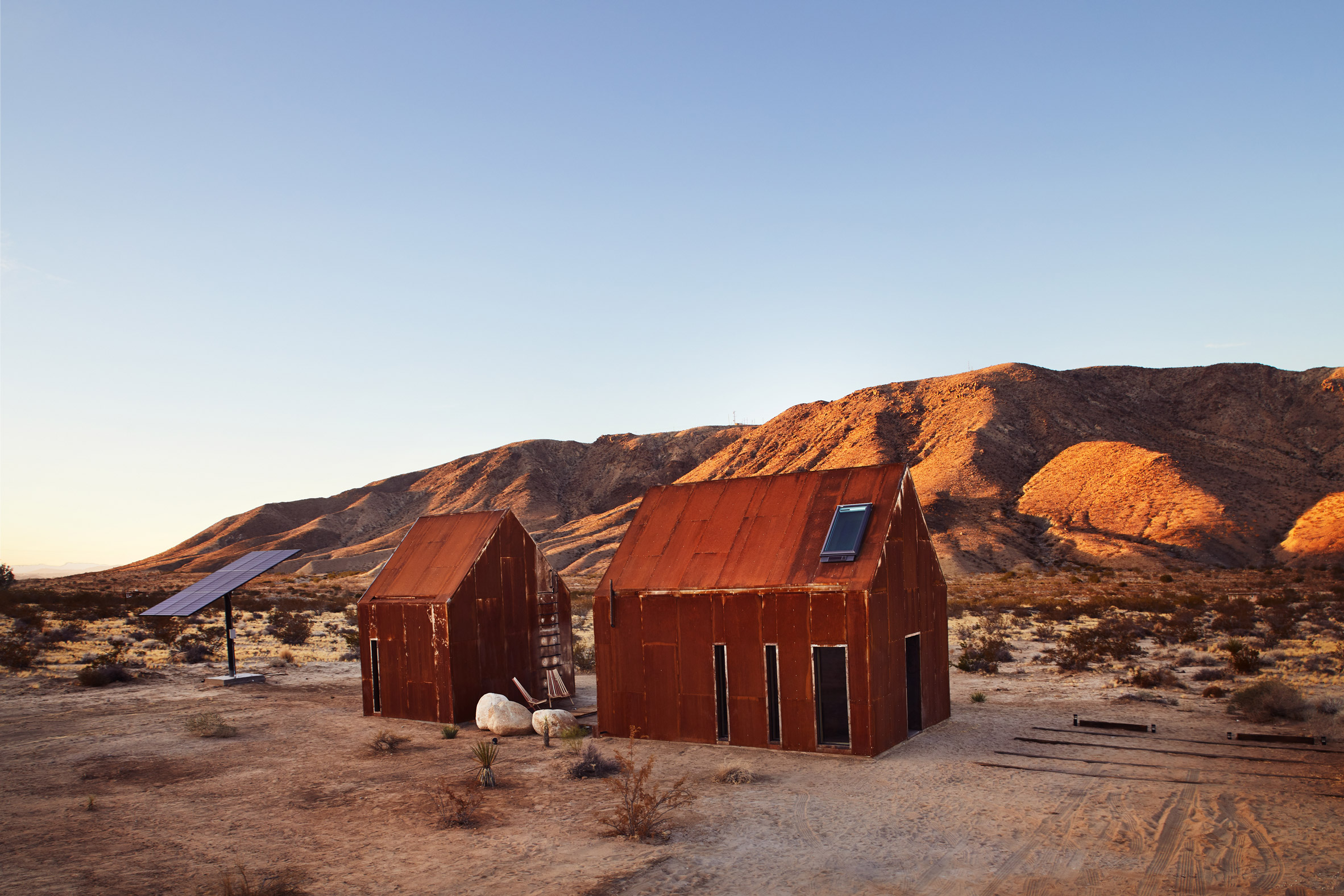 Gabled Metal Folly Cabins Provide Glamping Site In Joshua Tree