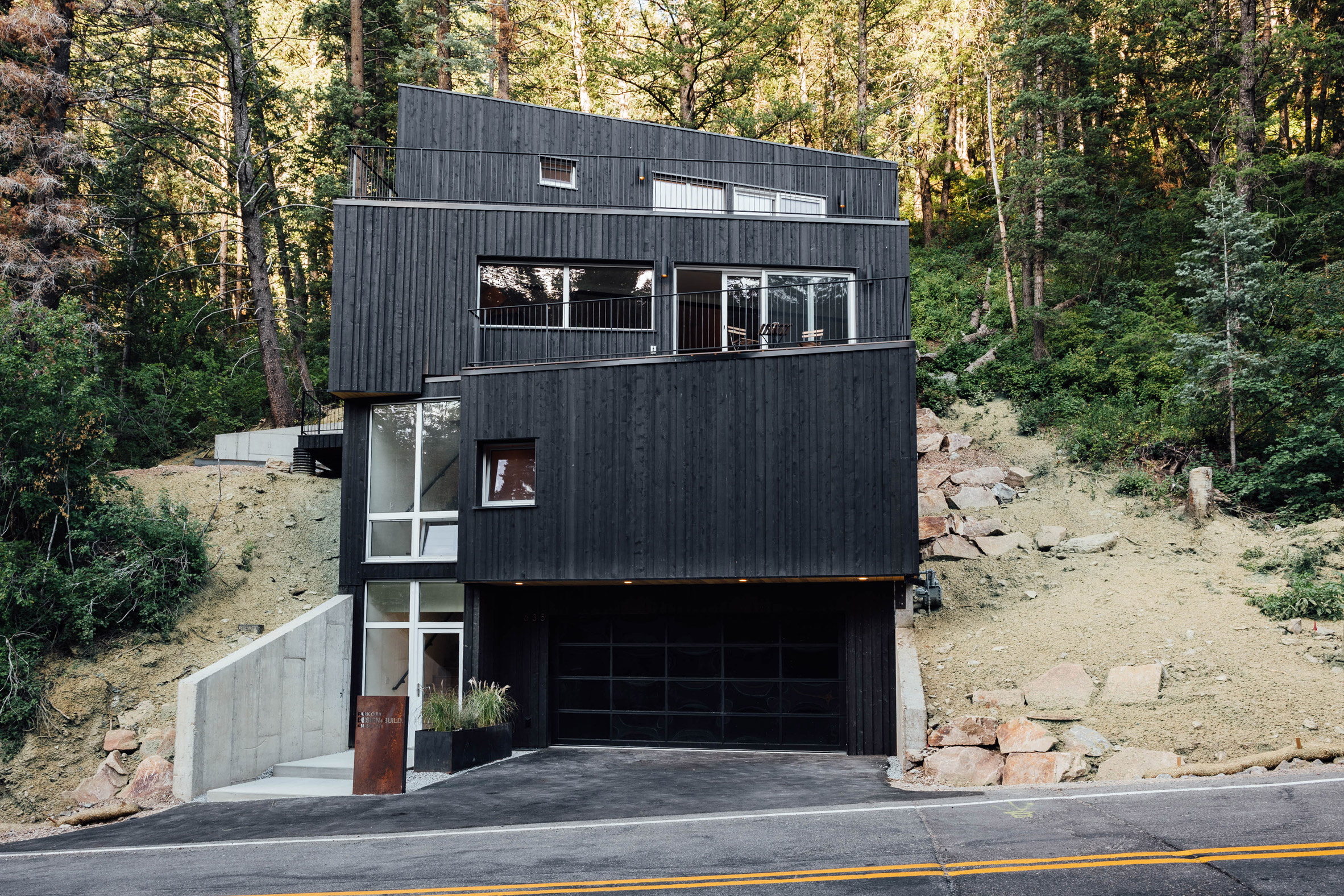 Chris Price's black TreeHaus staggers down wooded hill in Utah