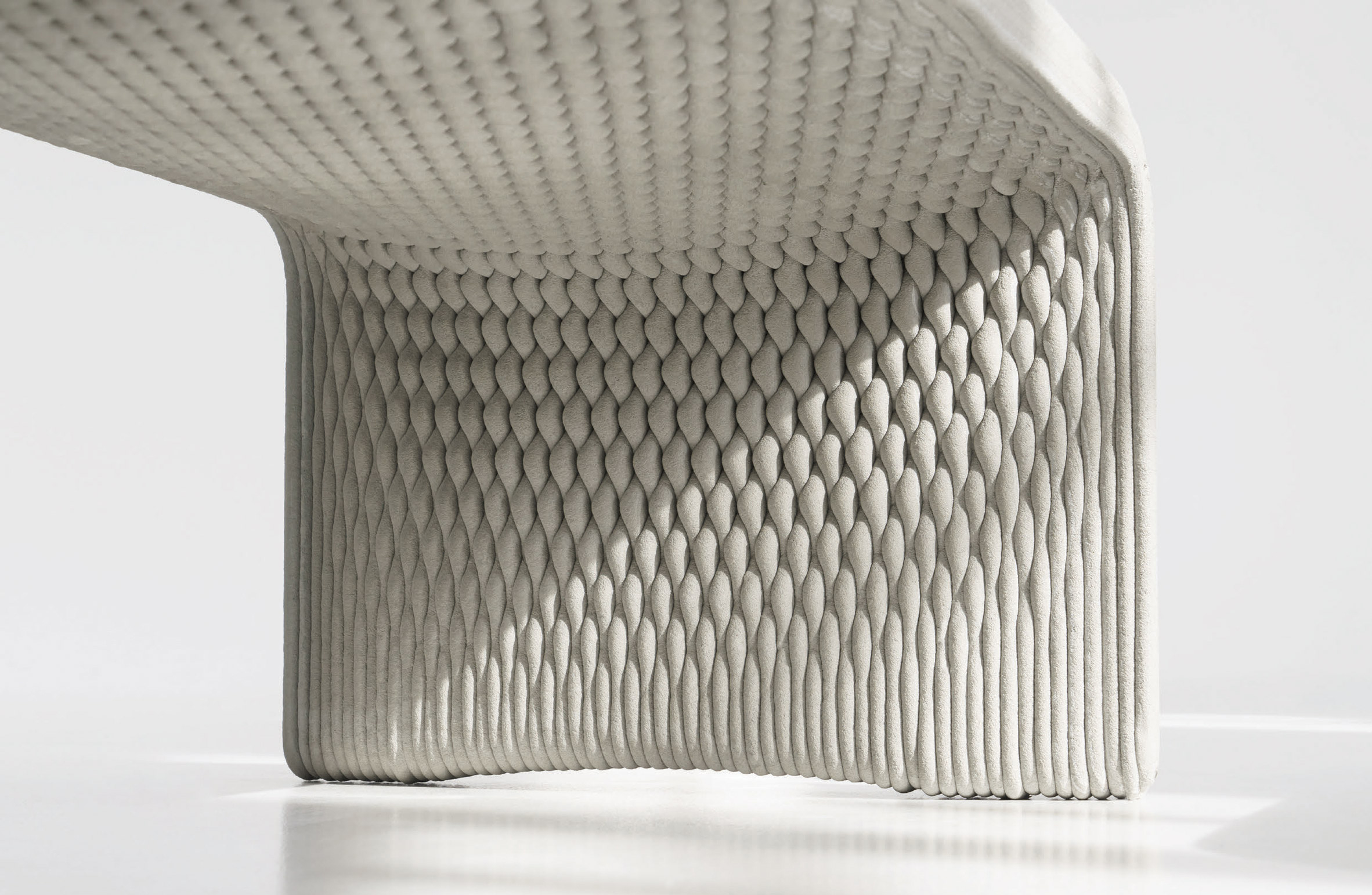 Woven concrete benches by Studio 7.5 and XstreeE