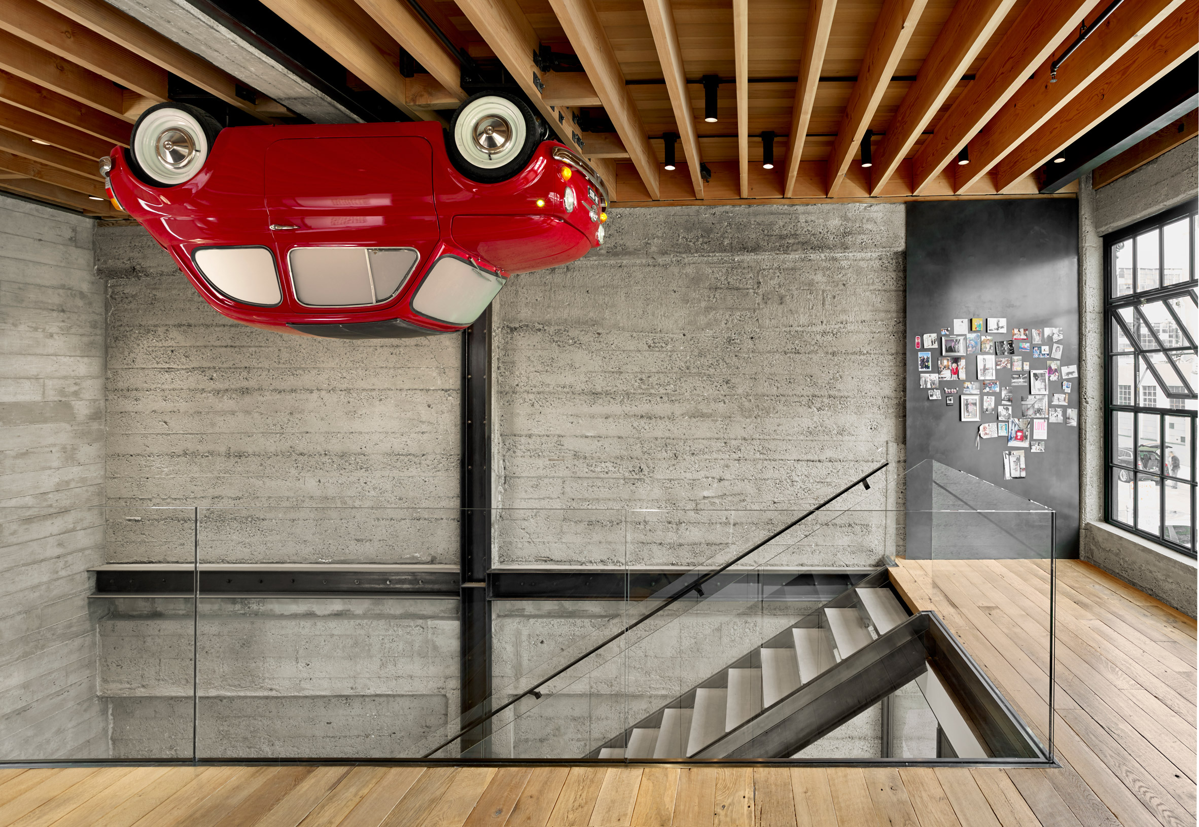 Vintage car mounted to ceiling in SOMA Residence by Dumican Mosey