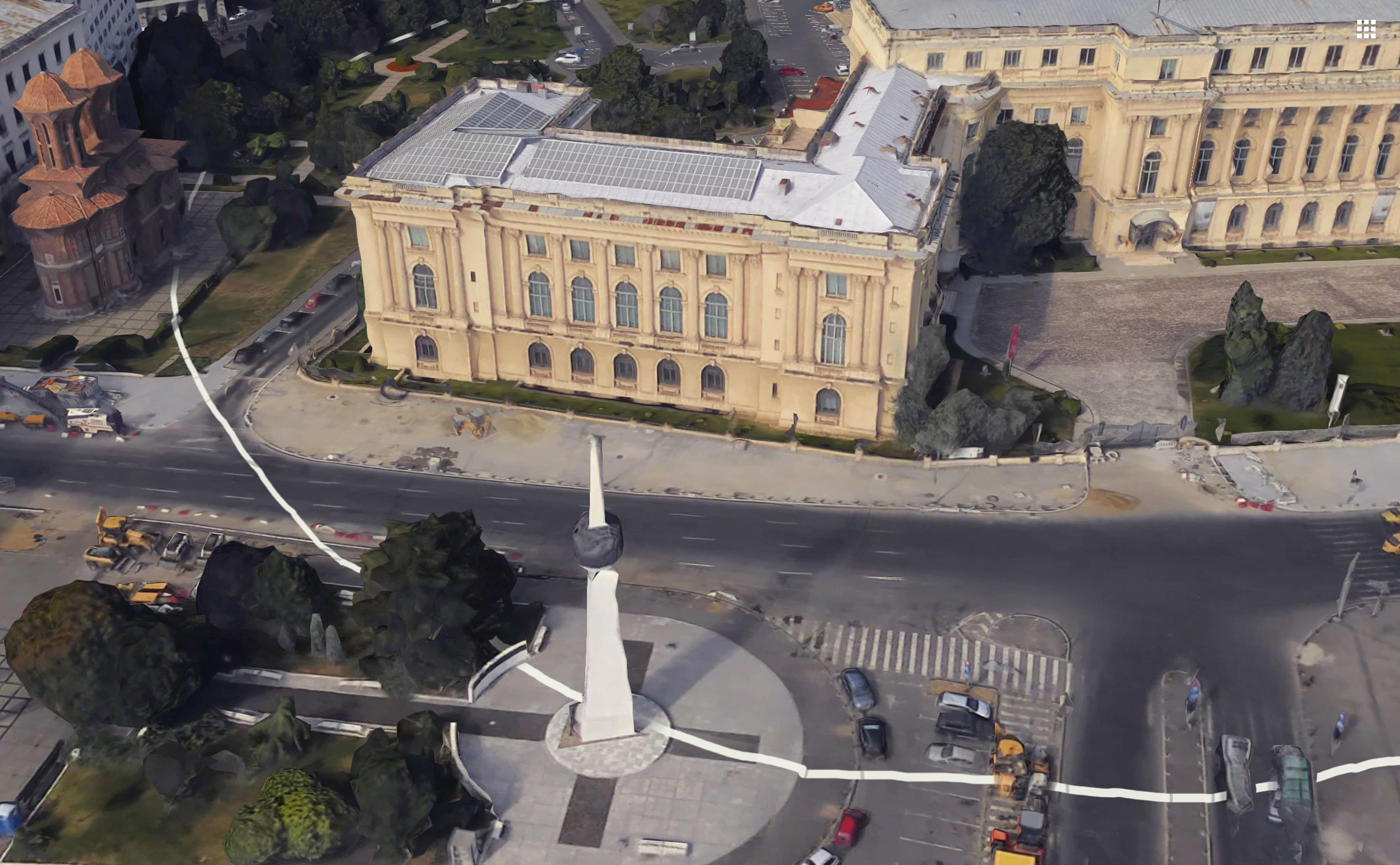 Artist paints impermanent white circle around the Romanian National Museum of Art