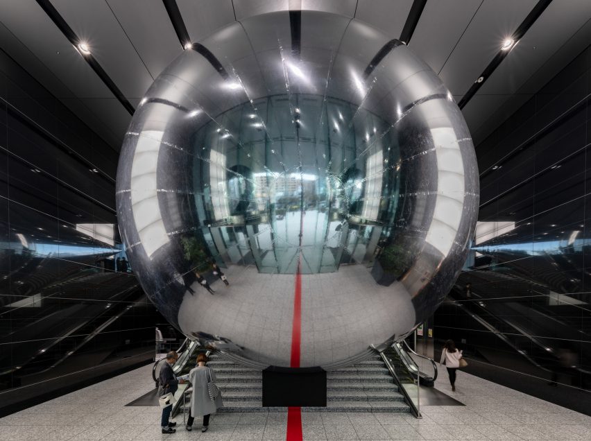 Giant mirrored ball installed in Tokyo office to encourage city to think beyond 2020 Olympics