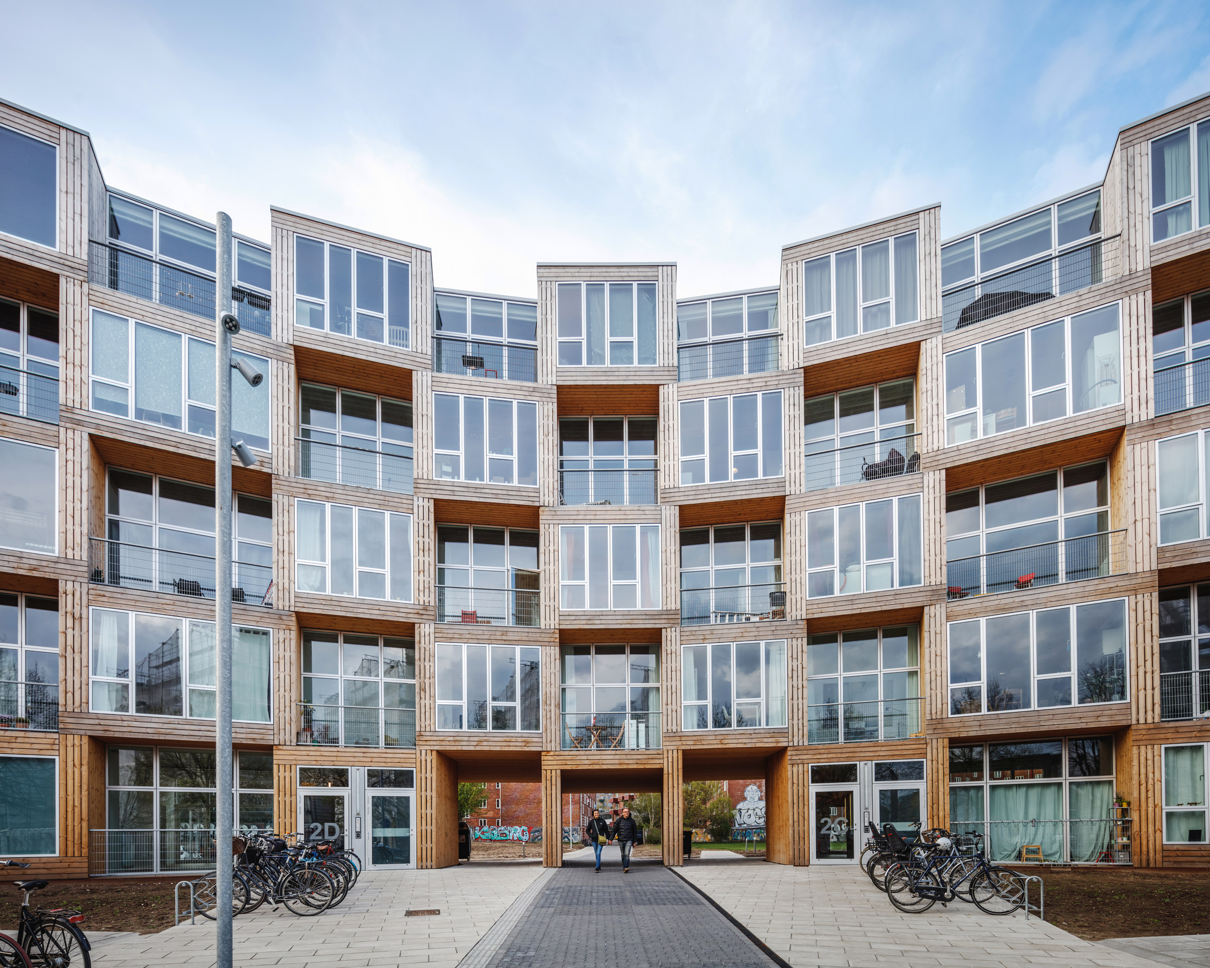 BIG builds "winding wall" of affordable housing in Copenhagen