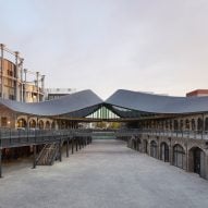 Heatherwick Studio joins roofs of two warehouses at Coal Drops Yard shopping centre