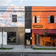 Svelte coffee shop by Boscardin Corsi slots between two stores in Brazil