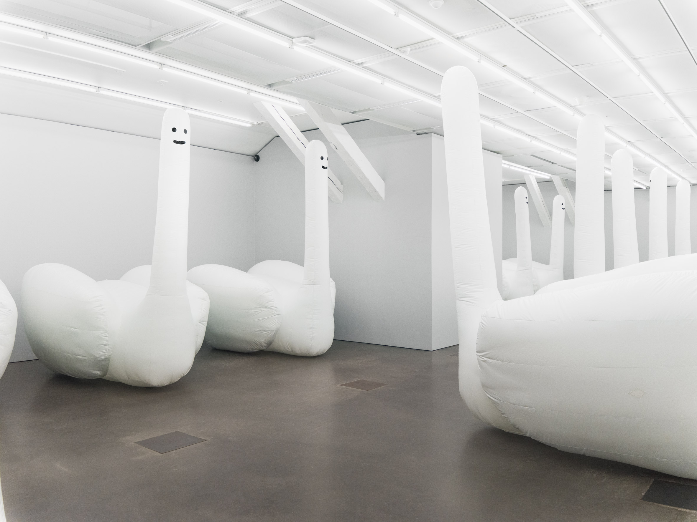 David Shrigley's inflatable "swan-things" spring to life in 12 minute cycles